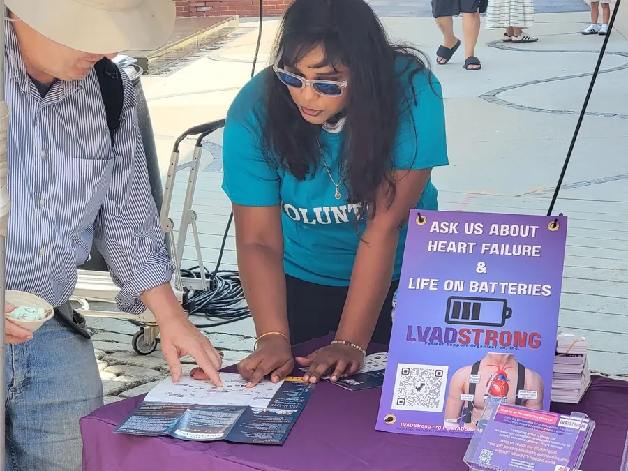 volunteer at lvadstrong booth at event
